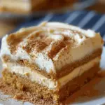 Pumpkin Spice Gooey Cake with Cream Cheese Frosting
